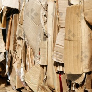 ESSEX, UK, 24/03/2024. Stacked flattened cardboard sheets in recycling storage area