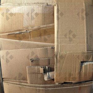 ESSEX, UK, 24/03/2024. Stacked flattened cardboard sheets in recycling storage area